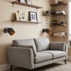 Aplique de pared Alsen con pantalla cónica negra y dorada, set de 2, con foco orientable