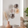 Aplique de pared moderno Gastor con tres globos de vidrio ahumado y ámbar, E14