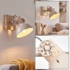 Aplique mural orientable Orny con pantalla inclinada, como luz de lectura junto al sofá