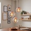 Lámpara colgante Gastor, ajustable durante montaje, tres globos ámbar y transparentes