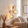 Aplique de pared moderno Koyoto con tres pantallas esféricas ámbar y luz en la pared