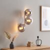 Aplique de pared Gastor moderno con tres pantallas esféricas ahumadas