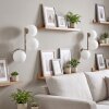 Aplique de pared Gastor moderno, set de 2, 3 esferas blancas, junto al espejo