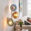 Moderna aplique de pared Koyoto con tres pantallas esféricas de vidrio azul, verde y dorado