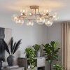 Lámpara de techo Chehalis, racimo de 12 luces con brazos curvados y vidrio transparente
